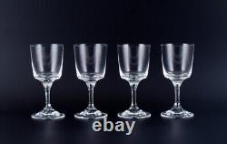 A set of four René Lalique Chenonceaux red wine glasses. Mid-20th C, France