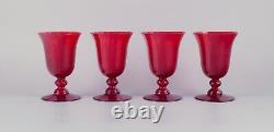 Set of four large red wine glasses. Sweden. Late 20th century